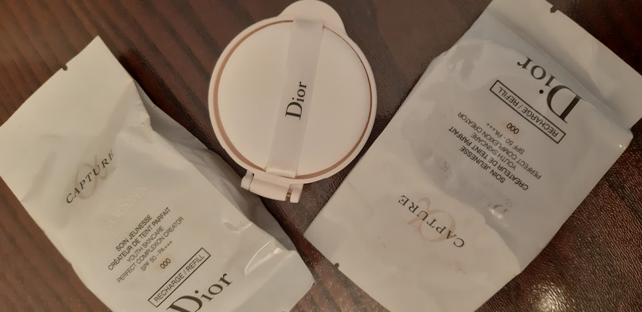 Dior capture dream skin тональный крем кушон 000