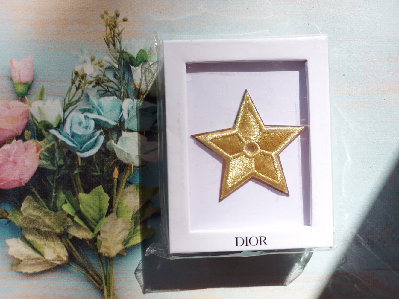 Брошь Dior звезда